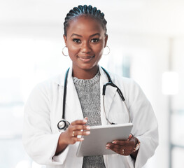 Portrait, tablet and healthcare with a doctor black woman in the hospital for insurance or...