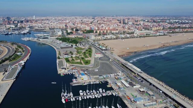 4K Drone Footage. Valencia. Aerial View yacht harbor port, beach, building. Spain. 28 may 2023