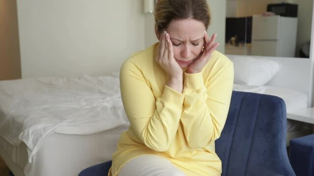 Cervicogenic migraine, Headache pain, woman suffering from headache at home