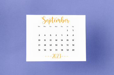 The September 2023 Monthly calendar for 2023 year on purple background.