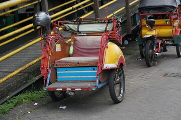 Surakarta, Indonesia -05 May 2023; Becak is a traditional means of transportation, tourist...