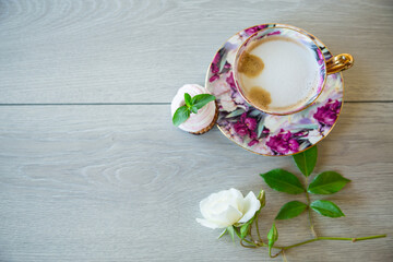 hot natural coffee with milk in a cup