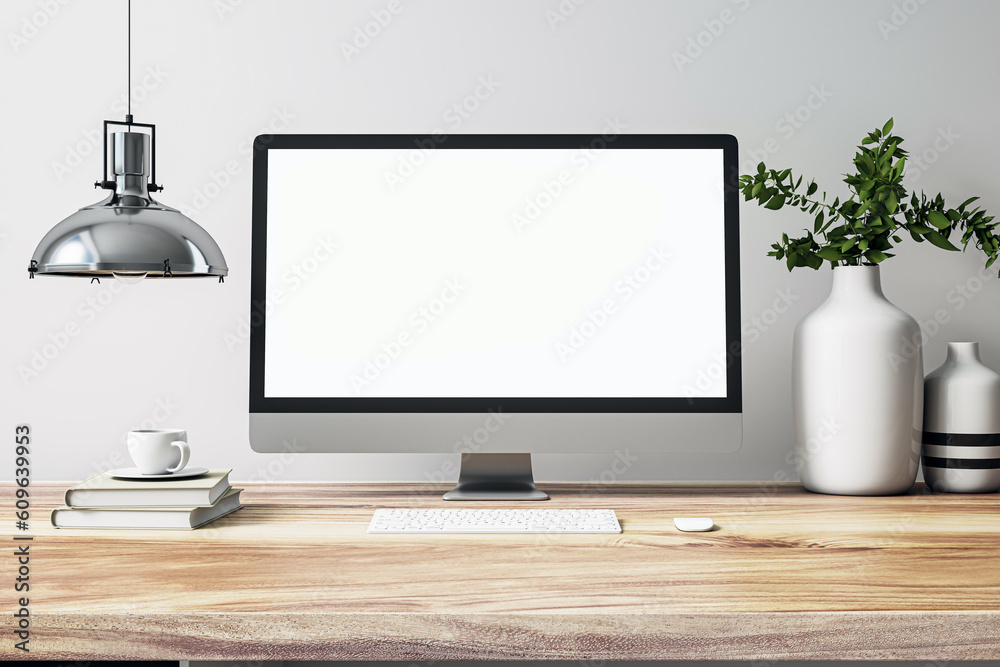 Poster Front view on blank white modern computer monitor screen with place for web design or landing page on sunlit workspace wooden table with chrome lamp and white wall background. 3D rendering, mockup