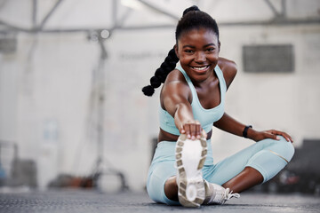 Gym, portrait or black woman stretching legs for workout routine or body movement for active...