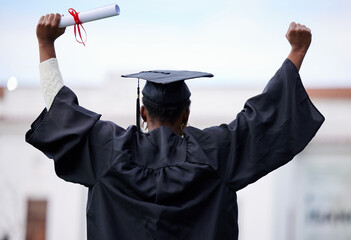 Back, education and black woman with graduation, celebration and success with a diploma. Female...