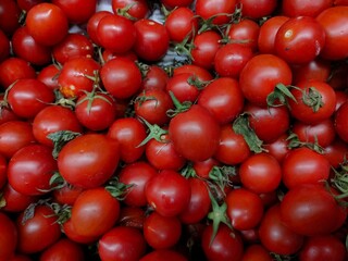 piles of tomatoes fresh that are sold in supermarkets, shopping for a month's needs for cooking
