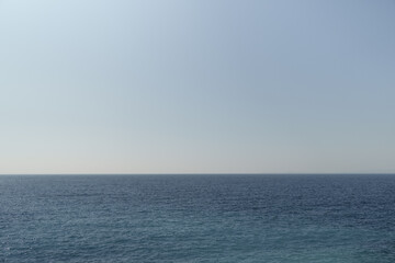 Fototapeta premium Mediterranean sea background with clear blue sky