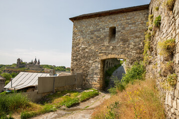 Fototapeta na wymiar Medieval gate in the historic part of Kamianets-Podilskyi, Ukraine.