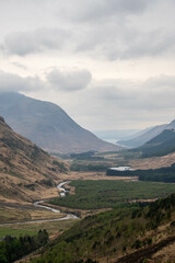 Naklejka premium Landscape of the Scottish West Highlands, Rocky Hills, Munroes, Misty snow-capped Mountains