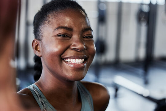 Gym, portrait or black woman with smile in selfie on workout, exercise or training break on social media. Funny influencer, face or happy African girl smiling for pictures or online fitness content