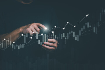 Planning and strategy, stock market, business growth, progress or success concept, businessman or trader showing growing virtual holographic stocks, invest in stock market trading or digital assets