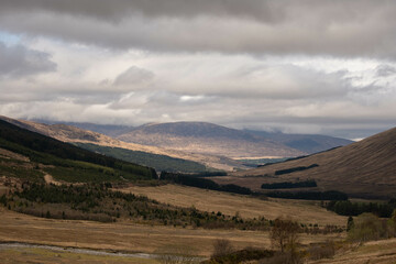 Landscape of the Scottish West Highlands, Rocky Hills, Munroes, Mountains, cloudy mountain peaks,