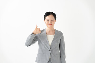 スーツ姿の女性　サムズアップ