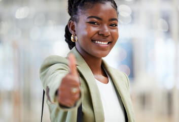 Business woman, portrait smile and thumbs up for winning, success or good job at the office. Happy...