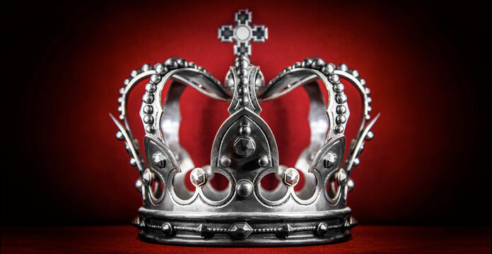 Crown. Golden crown on red velvet background.