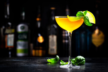 Spring grass alcoholic cocktail drink with whiskey, apple liqueur, ginger syrup, lemon juice, green...