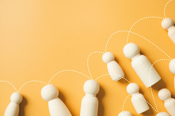 Social gathering and business networking global communication linking line on the wooden figurines...