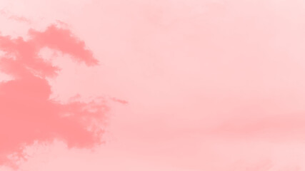 Abstract coral pink soft color sky background with blurred clouds, copy space, panorama