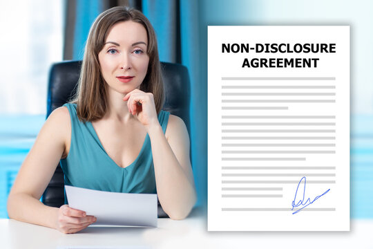 Woman and NDA contract. Non-disclosure agreement. Businesswoman is looking at camera. NDA document. Agreement on non-disclosure of important data. Business woman with NDA contract.