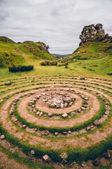 Fairy Glen of Uig, Scotland. A simetric stone pile around peaks in the highlands