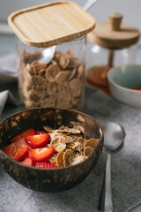 Bowl with yogurt, fruit and cereals