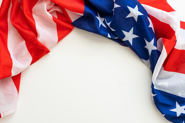 Closeup of American flag on plain background