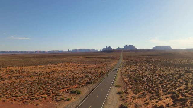 Immerse yourself in the stunning vistas of Monument Valley, Arizona, as our drone takes you on a breathtaking journey.