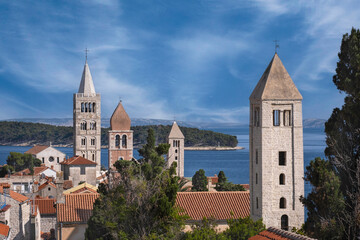 Fototapeta na wymiar Famous medieval bell towers in the old town of Rab, Croatia