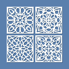 Laser cut wood coasters. Geometric decorative mandala designs.