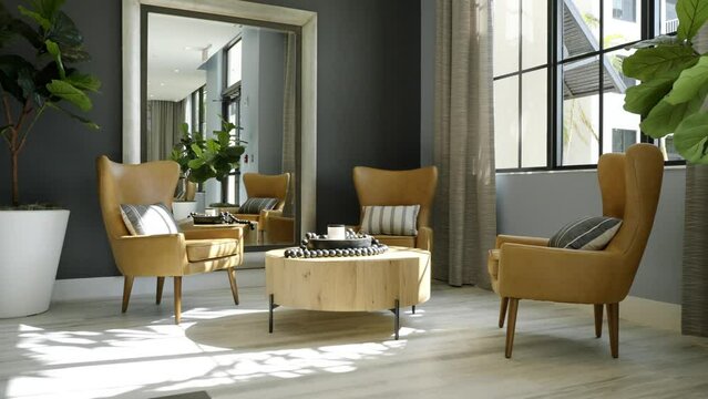 Stylish living room furnished with three yellow chairs with cushions, wooden coffee table and big mirror on dark grey wall. Tropical greenery in pots. Sunlight coming from windows