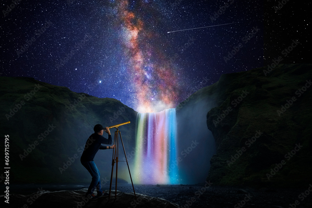 Canvas Prints man observing the universe through a telescope