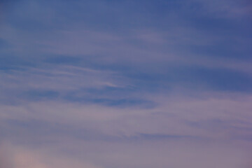 Soft lines of clouds in the sky at sunset