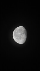 full moon over blue sky