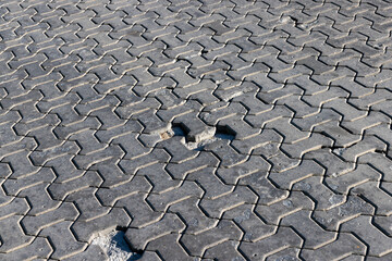part of the road made of concrete tiles