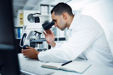 Science, scientist and man with microscope in laboratory for medical research, analysis and dna test. Healthcare, biotechnology and male chemist with equipment for study, medicine sample and virus