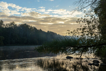 A little fog on the river in autumn