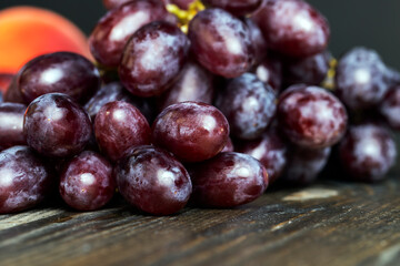 Ripe fresh grapes on a board