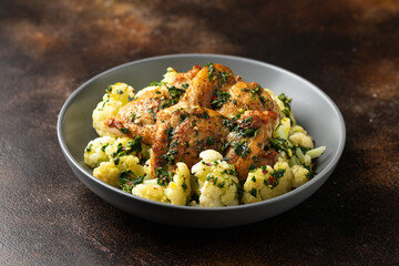 Homemade Chimichurri Chicken thighs with cauliflower. Healthy food