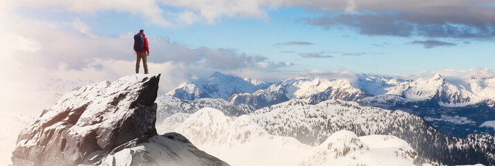 Adventurous Man Standing on top of Mountain Cliff. Exteme Adventure Composite © edb3_16