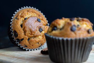 Cupcake with chocolate pieces, close up
