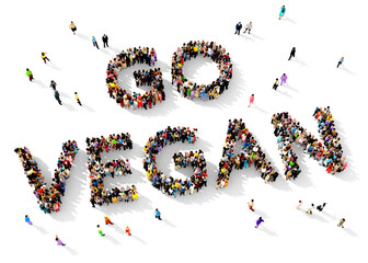 Large group of multiracial people gathered together in the shape of 