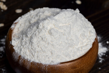 Wheat flour from a wooden bowl