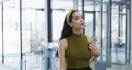 Walk, office and confident business woman in lobby of workplace or company. Female professional, walking and person, entrepreneur or employee in hallway, passageway or corridor ready to start work.
