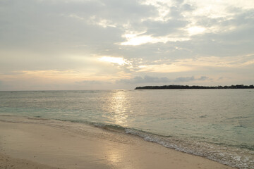 Lombok and Gili Air islands, overcast, cloudy day, sky and sea. Sunset, sand beach.