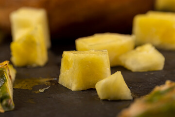 sliced ripe yellow pineapple, a large number of pieces
