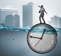 Businessman in deadline and time management concept