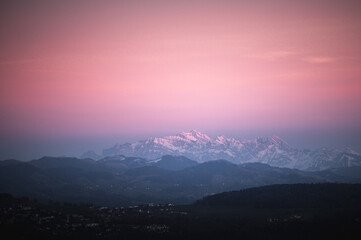 Säntis over Zurich in a late pink afternoon