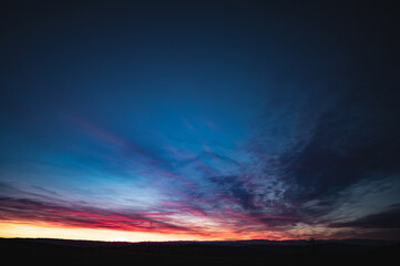 Dramatic sunset skies with pink clouds