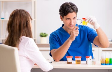 Patient visiting doctor for urine test