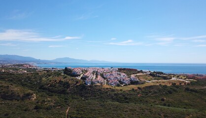 aerial view overlooking Manilva coast holiday homes at the  Costa del Sol with the Mediterranean...
